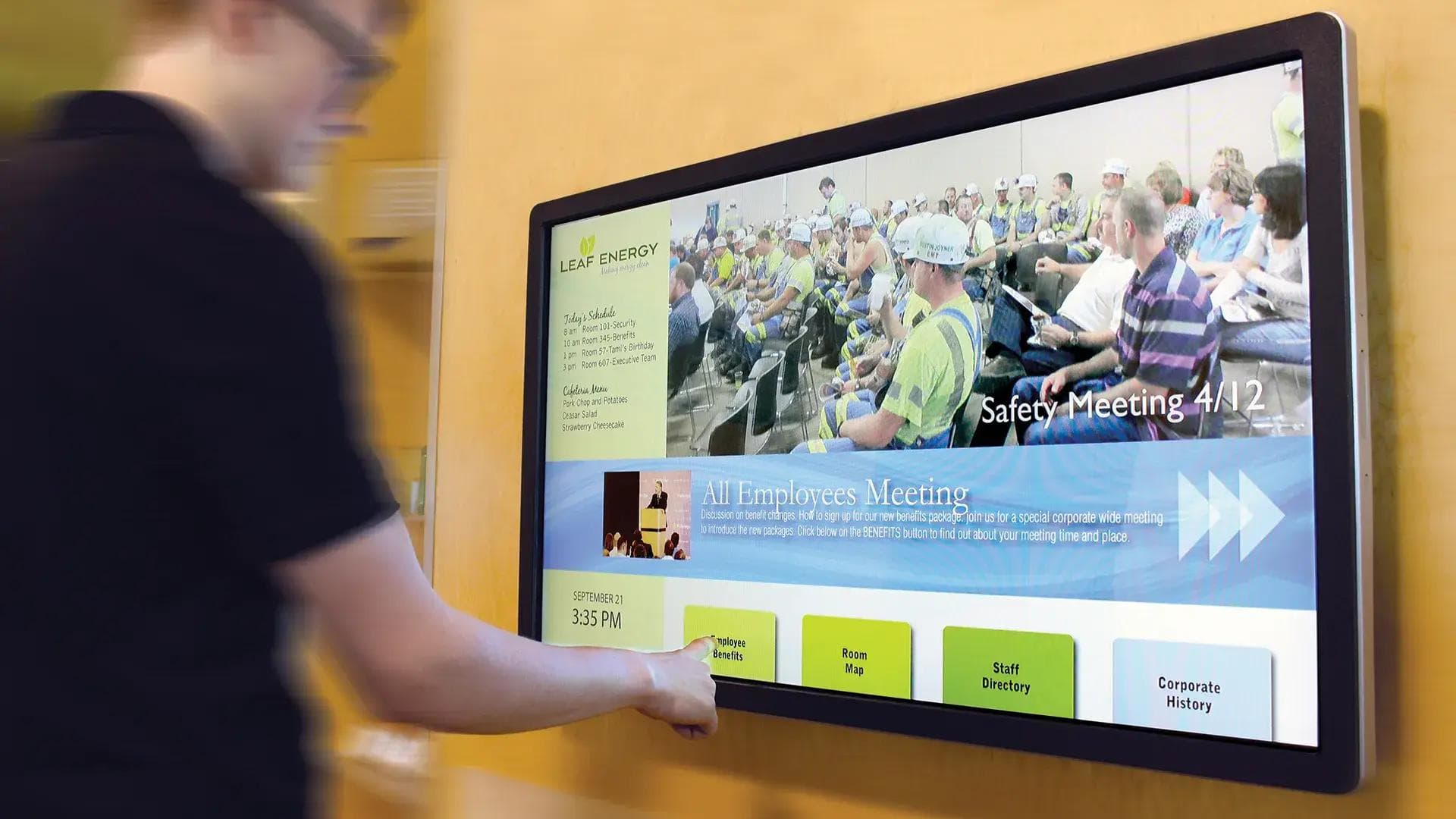 Employee engagement interactive digital signage screen in a workplace.