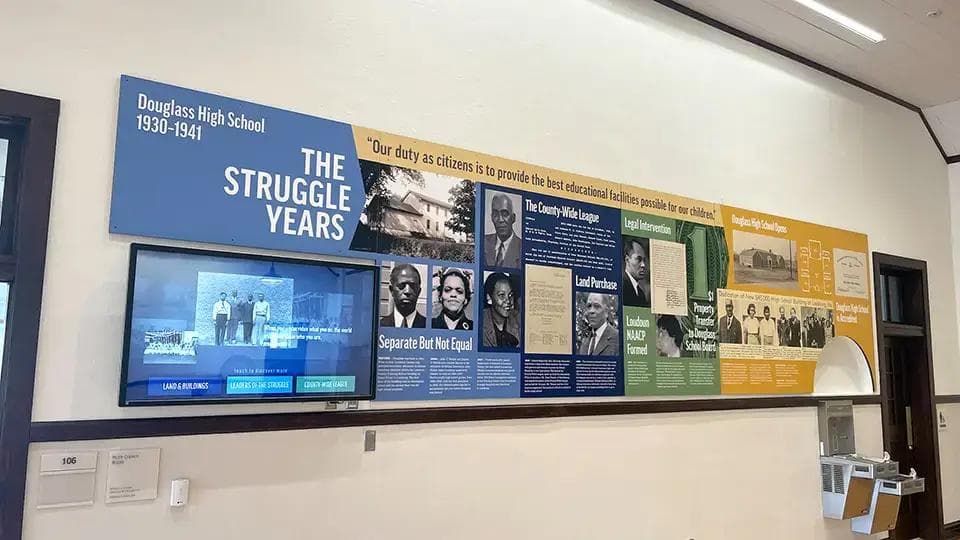 A school history digital display wall.