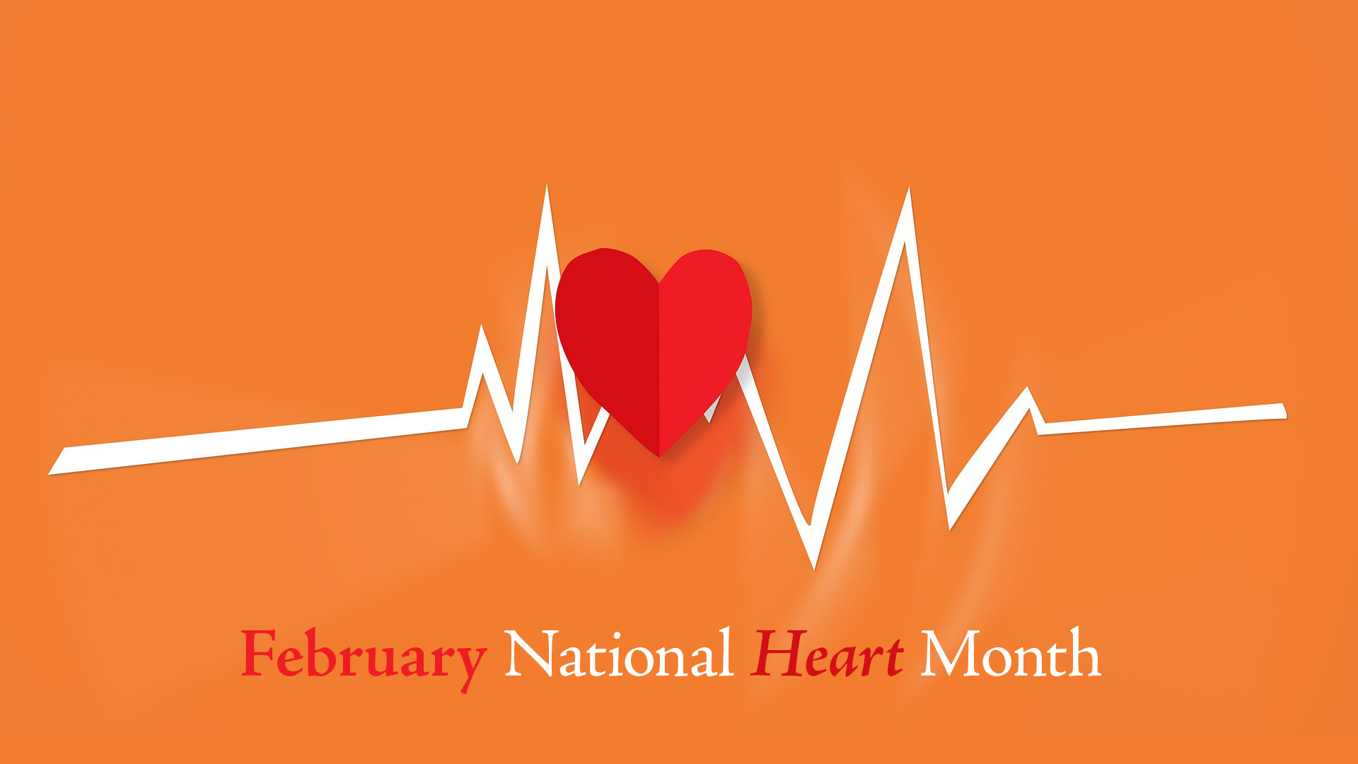 Orange background white a Red heart in the middle with a White heart beat spanning across the graphic. "February NAtional Heart Month is spelled out across the bottom of the graphic in a serif font, calling out February and Heart.
