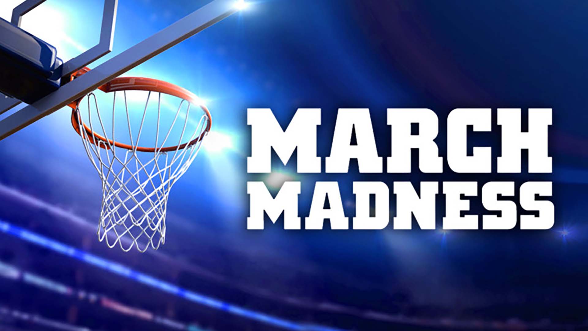 Angled photo of a basketball hoop from behind. Dark lit up arena. March Madness written in a white thick serif font