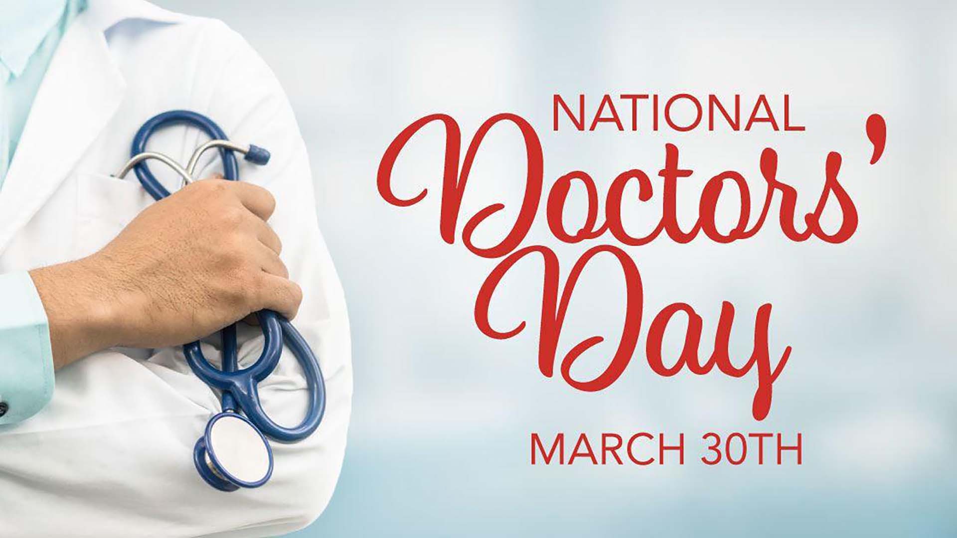 Doctor cut off toward the left side of the graphic with a stethoscope in their hand. Their arms are crossed. National Doctors Day March 30th spelled out on the right side of the graphic with a blurred background.