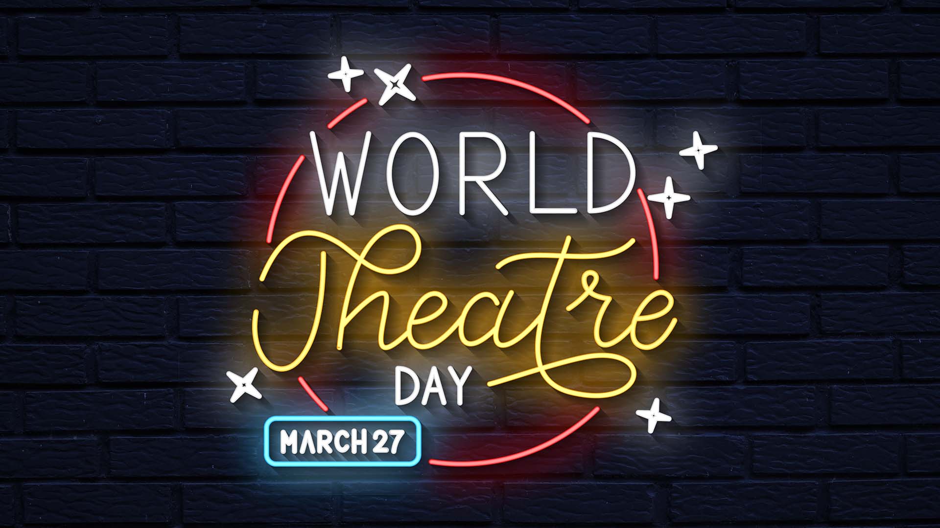 black brick background with a neon sign spelling out "World Theater Day March 27"