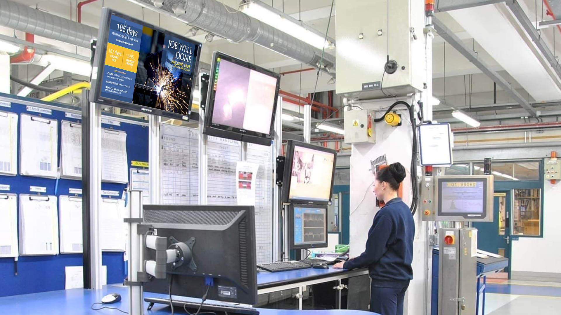 Arreya Digital Signage plays in a manufacturing work station for employee work related numbers and goals