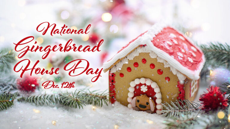 A close up photo of a small gingerbread dog house sits on top of a sparkly, fake snow surface and is surrounded by red pompoms and pine needles. The house is on the right side of the graphic. On the left, overtop the image, is the message, “National Gingerbread House day Dec. 12th.” A red cursive font with a white drop shadow was used.