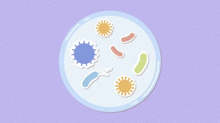 A video animation of cutout paper germs popping up in a white Petri dish. The dish is a white circle in the center of the video. The background is lavender.