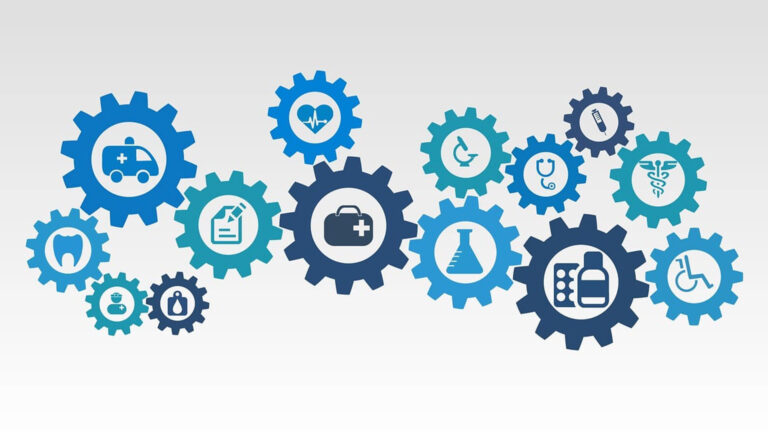 A light gray to white gradient background. Blue, teal, navy, and light blue gear icons of various sizes are scattered, but touching, across the center horizontally. Inside each ear is another icon related to the medical field.